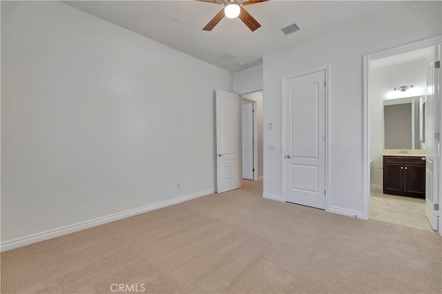 13691 Cobalt Ct, Rancho Cucamonga, CA 91739 - unfurnished bedroom featuring light colored carpet, baseboards, ensuite bath, and a sink
