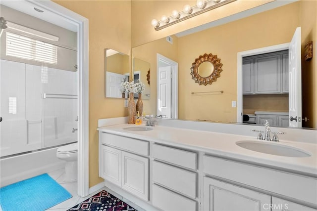 1137 Pamplona Dr, Riverside, CA 92508 - bathroom with toilet, double vanity, combined bath / shower with glass door, and tile patterned floors