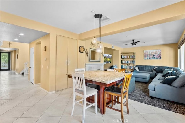 1137 Pamplona Dr, Riverside, CA 92508 - dining space with light tile patterned floors, a ceiling fan, and baseboards