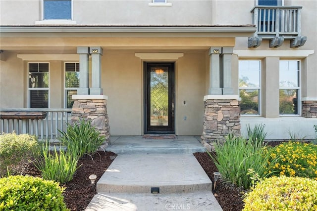 1137 Pamplona Dr, Riverside, CA 92508 - doorway to property with a porch, stucco siding, and stone siding