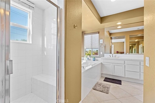 1137 Pamplona Dr, Riverside, CA 92508 - bathroom with vanity, a garden tub, a stall shower, healthy amount of natural light, and recessed lighting