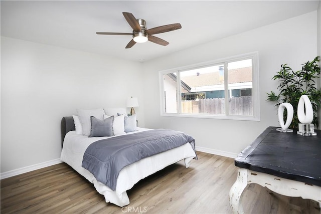 321 S Beachy Pl, Anaheim, CA 92804 - bedroom with wood finished floors, baseboards, and ceiling fan