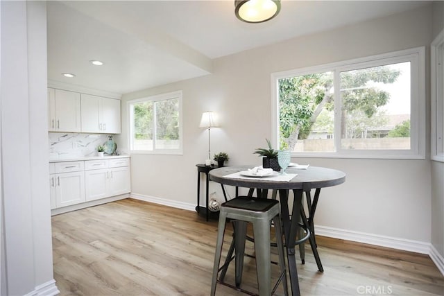 321 S Beachy Pl, Anaheim, CA 92804 - dining room with light wood-style floors, baseboards, and recessed lighting