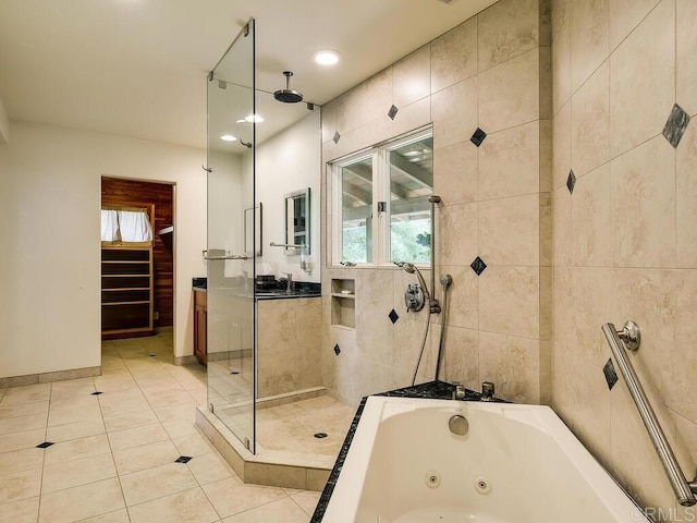 6418 Paseo Delicias, Rancho Santa Fe, CA 92067 - full bathroom with tiled shower, a whirlpool tub, healthy amount of natural light, and tile patterned flooring