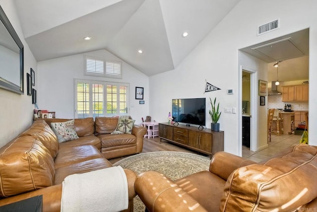 232 Hygeia Ct, Encinitas, CA 92024 - living area with attic access, high vaulted ceiling, and recessed lighting