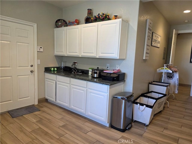 42036 Desert Sage Ave, Lancaster, CA 93536 - kitchen with light wood-type flooring, white cabinets, and recessed lighting
