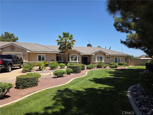 42036 Desert Sage Ave, Lancaster, CA 93536 - ranch-style house featuring stucco siding, a tiled roof, and a garage