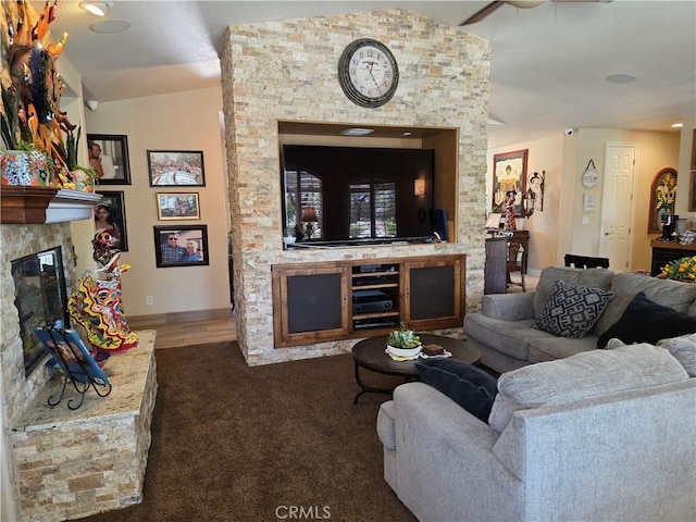 42036 Desert Sage Ave, Lancaster, CA 93536 - living area featuring a fireplace, lofted ceiling, carpet floors, baseboards, and a ceiling fan