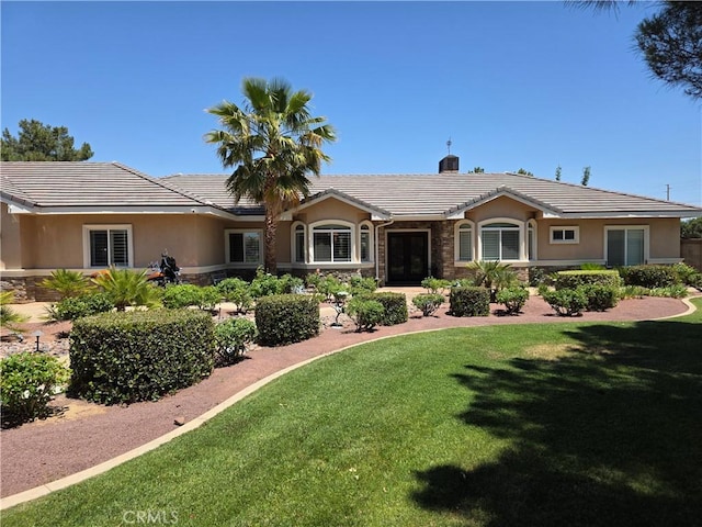 42036 Desert Sage Ave, Lancaster, CA 93536 - ranch-style house featuring stucco siding, stone siding, a tile roof, and a front yard