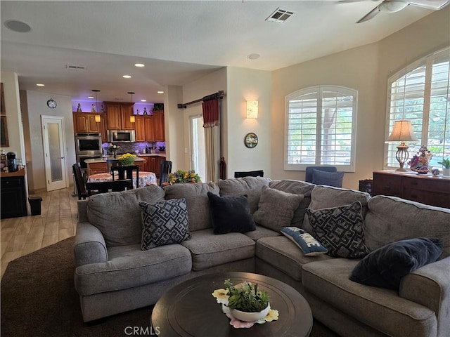 42036 Desert Sage Ave, Lancaster, CA 93536 - living room featuring recessed lighting and a ceiling fan