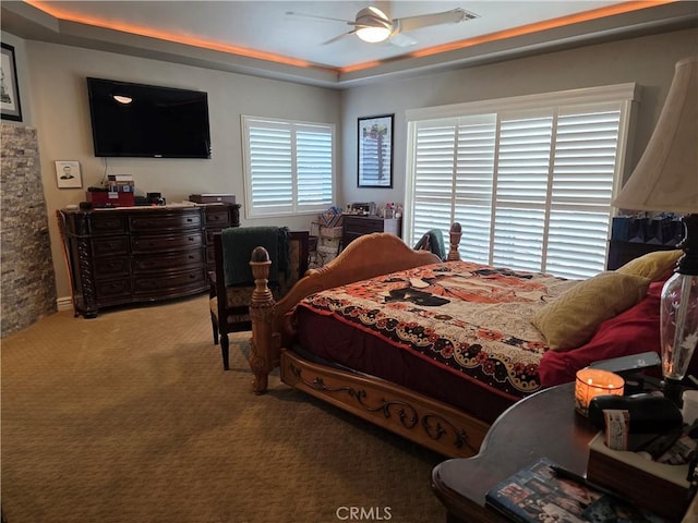 42036 Desert Sage Ave, Lancaster, CA 93536 - bedroom featuring a tray ceiling, carpet, and ceiling fan