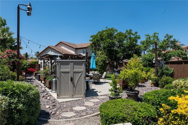 8340 Rosemary Dr, Riverside, CA 92508 - fenced backyard featuring a patio area