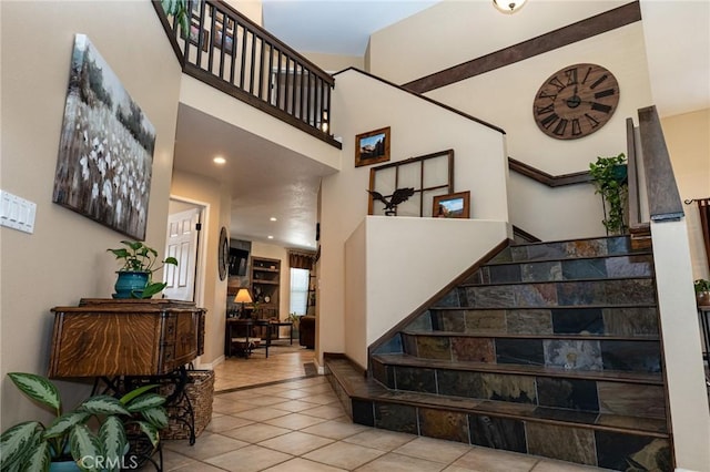 8340 Rosemary Dr, Riverside, CA 92508 - stairway featuring tile patterned flooring, a high ceiling, and recessed lighting
