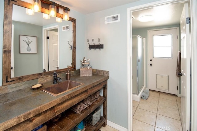 8340 Rosemary Dr, Riverside, CA 92508 - full bathroom featuring vanity, a stall shower, tile patterned floors, and baseboards