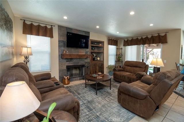8340 Rosemary Dr, Riverside, CA 92508 - living room with recessed lighting, tile patterned floors, and a tiled fireplace