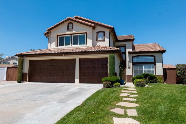 8340 Rosemary Dr, Riverside, CA 92508 - mediterranean / spanish-style house featuring driveway, stucco siding, a tile roof, and a garage