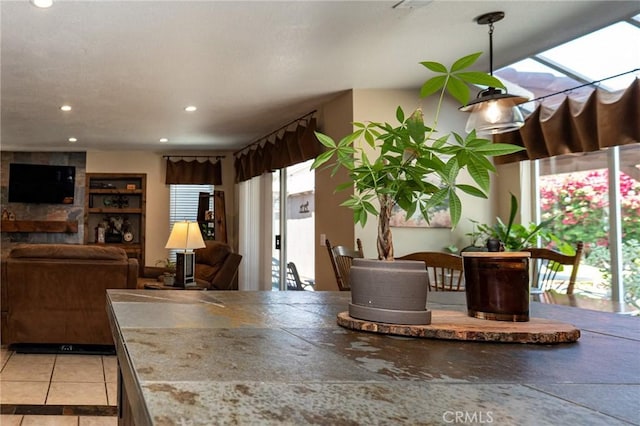 8340 Rosemary Dr, Riverside, CA 92508 - dining area with recessed lighting, light tile patterned flooring, and a fireplace