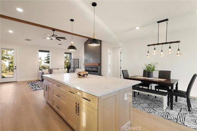 5539 Erin Way, Paradise, CA 95969 - kitchen featuring light wood-type flooring, a center island, decorative light fixtures, ceiling fan, and recessed lighting