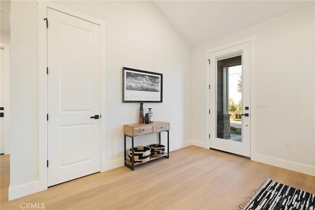 5539 Erin Way, Paradise, CA 95969 - foyer with light wood-style flooring, baseboards, and vaulted ceiling