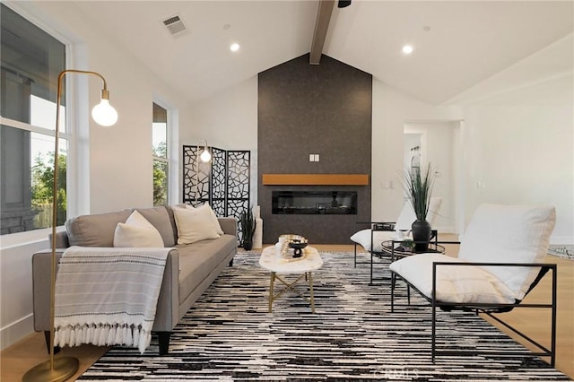 5539 Erin Way, Paradise, CA 95969 - living area with a glass covered fireplace, recessed lighting, and wood finished floors