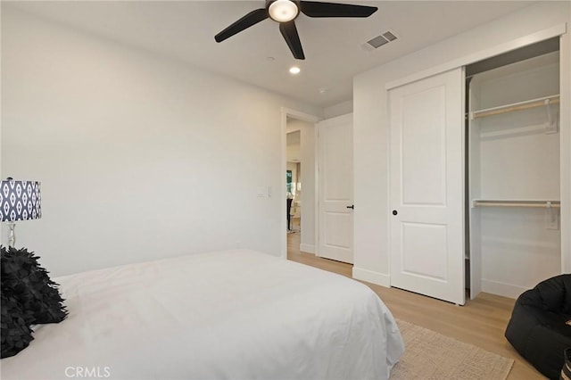 5539 Erin Way, Paradise, CA 95969 - bedroom with light wood-style flooring, recessed lighting, baseboards, ceiling fan, and a closet
