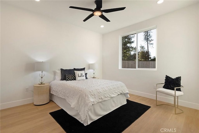 5539 Erin Way, Paradise, CA 95969 - bedroom featuring baseboards, recessed lighting, light wood finished floors, and ceiling fan
