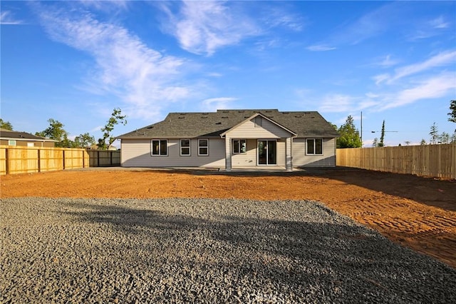 5539 Erin Way, Paradise, CA 95969 - rear view of property featuring a fenced backyard and a patio