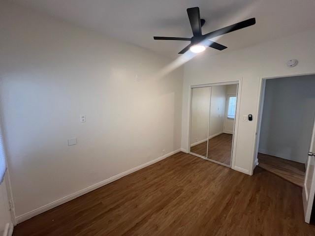 3320 E 8th St, Long Beach, CA 90804 - unfurnished bedroom featuring wood finished floors, a closet, baseboards, a ceiling fan, and lofted ceiling