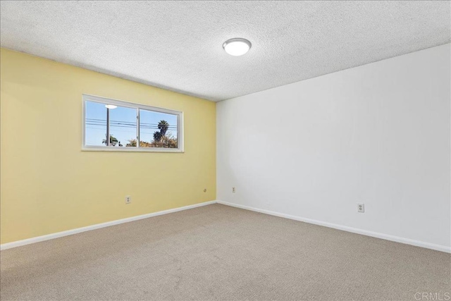 1597 Hermes St, San Diego, CA 92154 - empty room featuring carpet flooring, a textured ceiling, and baseboards