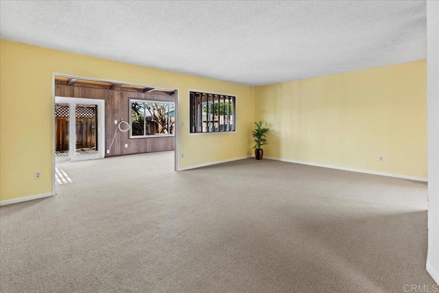 1597 Hermes St, San Diego, CA 92154 - empty room with carpet floors, a textured ceiling, and baseboards