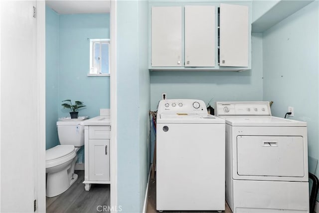 40632 Lela May Ave, Hemet, CA 92544 - laundry area with washer and clothes dryer and wood finished floors