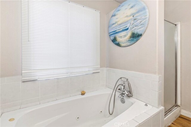 40632 Lela May Ave, Hemet, CA 92544 - bathroom featuring a whirlpool tub and a stall shower