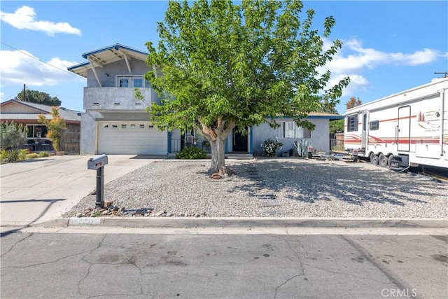 40632 Lela May Ave, Hemet, CA 92544 - view of front of house with an attached garage, concrete driveway, and stucco siding