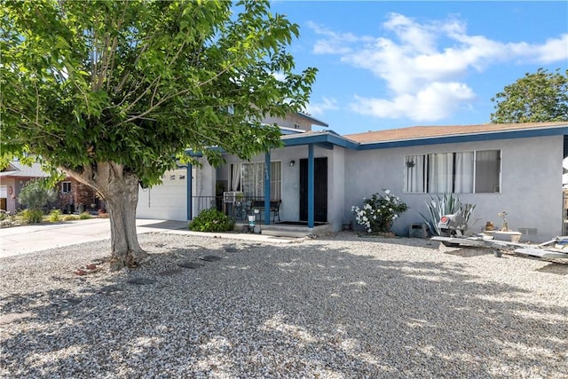 40632 Lela May Ave, Hemet, CA 92544 - view of front of property featuring stucco siding, an attached garage, and driveway