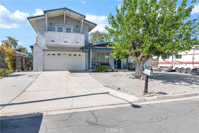 40632 Lela May Ave, Hemet, CA 92544 - traditional home featuring concrete driveway, an attached garage, stucco siding, and a balcony