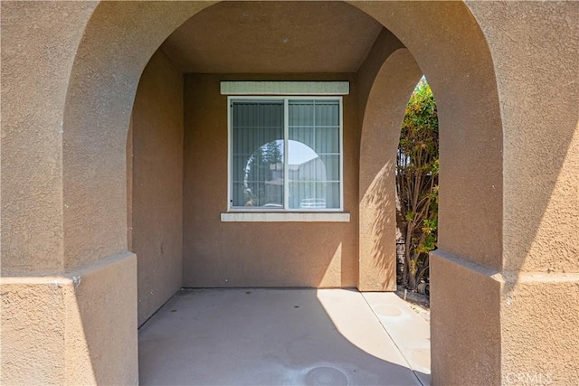 35602 Driftwood St, Winchester, CA 92596 - view of exterior entry featuring stucco siding and a patio area