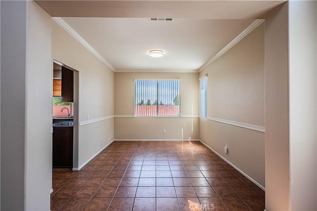35602 Driftwood St, Winchester, CA 92596 - tiled spare room with crown molding, baseboards, and a sink