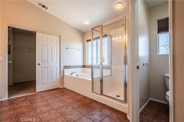 35602 Driftwood St, Winchester, CA 92596 - bathroom featuring a stall shower, a bath, toilet, a spacious closet, and tile patterned flooring