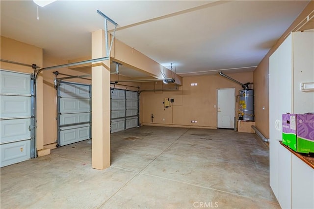 35602 Driftwood St, Winchester, CA 92596 - garage featuring water heater and a garage door opener