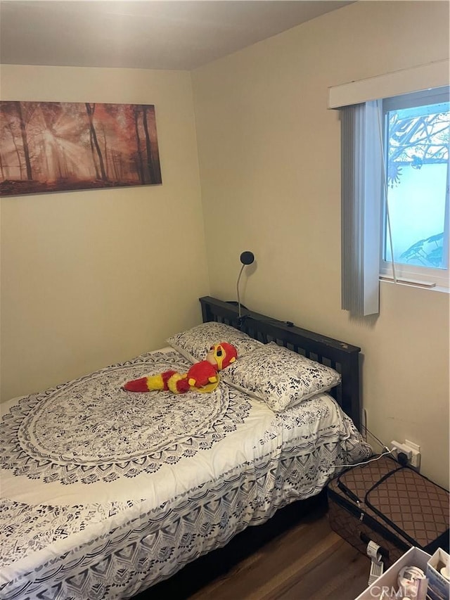 927 W 6th St, San Pedro, CA 90731 - bedroom with dark wood finished floors