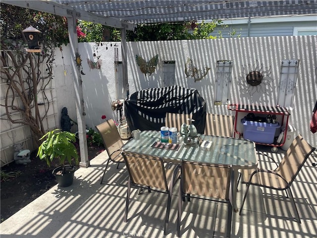 927 W 6th St, San Pedro, CA 90731 - fenced backyard featuring outdoor dining space, a patio area, and a pergola