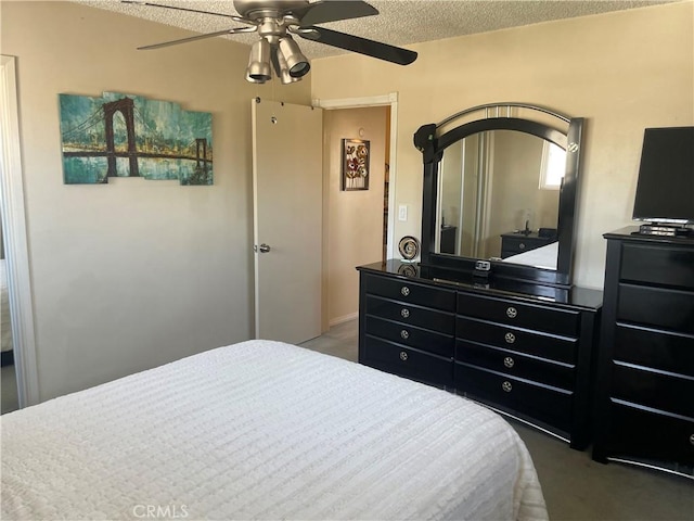 927 W 6th St, San Pedro, CA 90731 - carpeted bedroom featuring a textured ceiling and ceiling fan