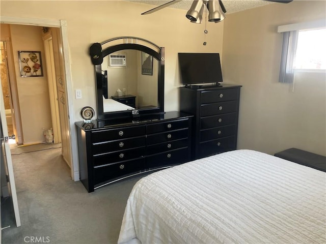 927 W 6th St, San Pedro, CA 90731 - bedroom featuring carpet, a wall mounted AC, a textured ceiling, and ceiling fan