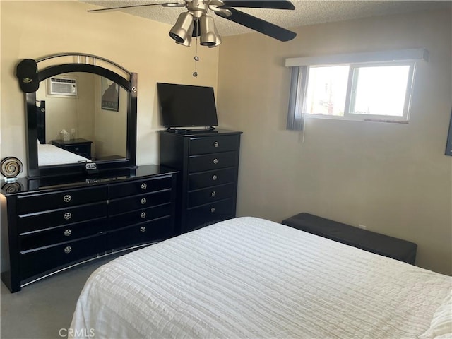 927 W 6th St, San Pedro, CA 90731 - bedroom with a textured ceiling, a wall unit AC, and a ceiling fan