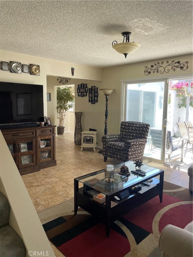 927 W 6th St, San Pedro, CA 90731 - living area with healthy amount of natural light, light tile patterned flooring, and a textured ceiling