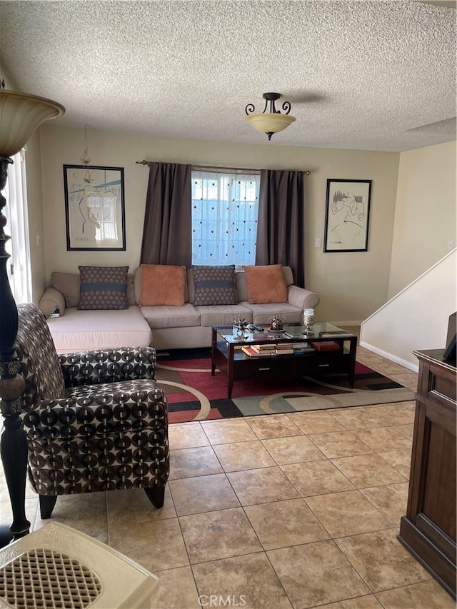 927 W 6th St, San Pedro, CA 90731 - living area with light tile patterned floors and a textured ceiling