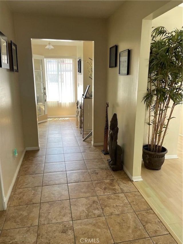 927 W 6th St, San Pedro, CA 90731 - hall featuring baseboards and tile patterned flooring