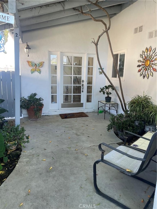 927 W 6th St, San Pedro, CA 90731 - property entrance with stucco siding and a patio area