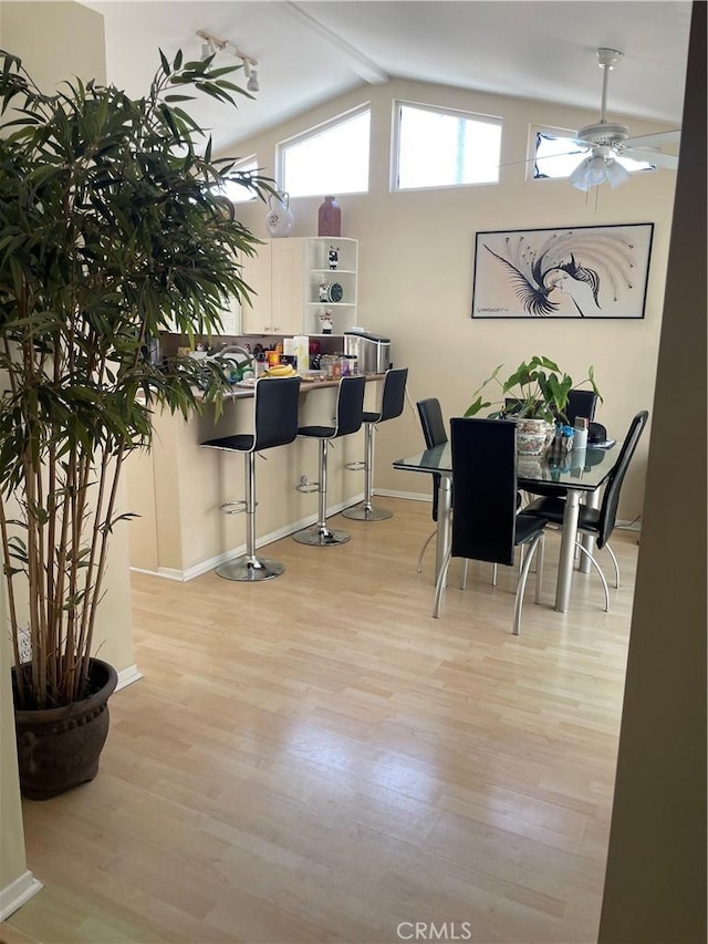 927 W 6th St, San Pedro, CA 90731 - dining room with light wood-style flooring, ceiling fan, and vaulted ceiling