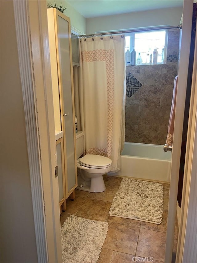 927 W 6th St, San Pedro, CA 90731 - bathroom featuring shower / bathtub combination with curtain and tile patterned flooring